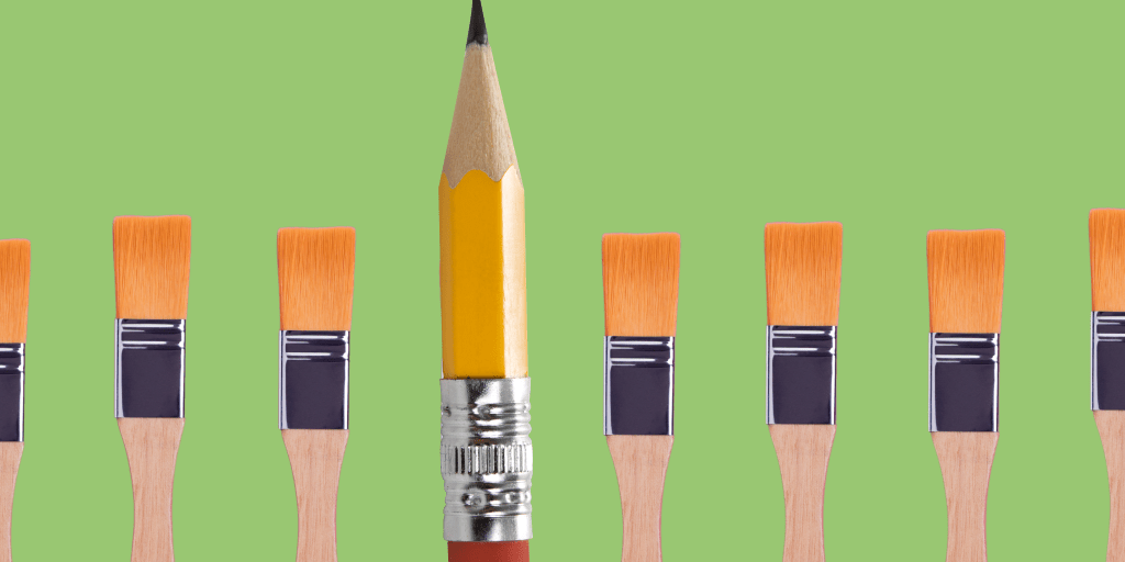 The odd one out pencil among brushes artist against green 