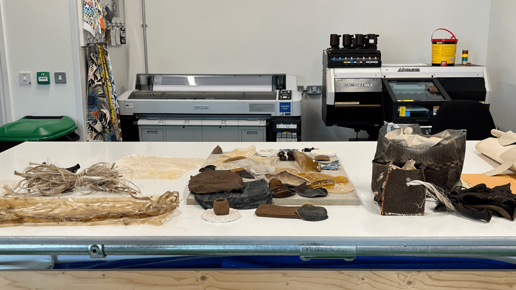 Biomaterials at STEAMhouse on the table, artist and manufacturing of biomaterials, printer and Production space image