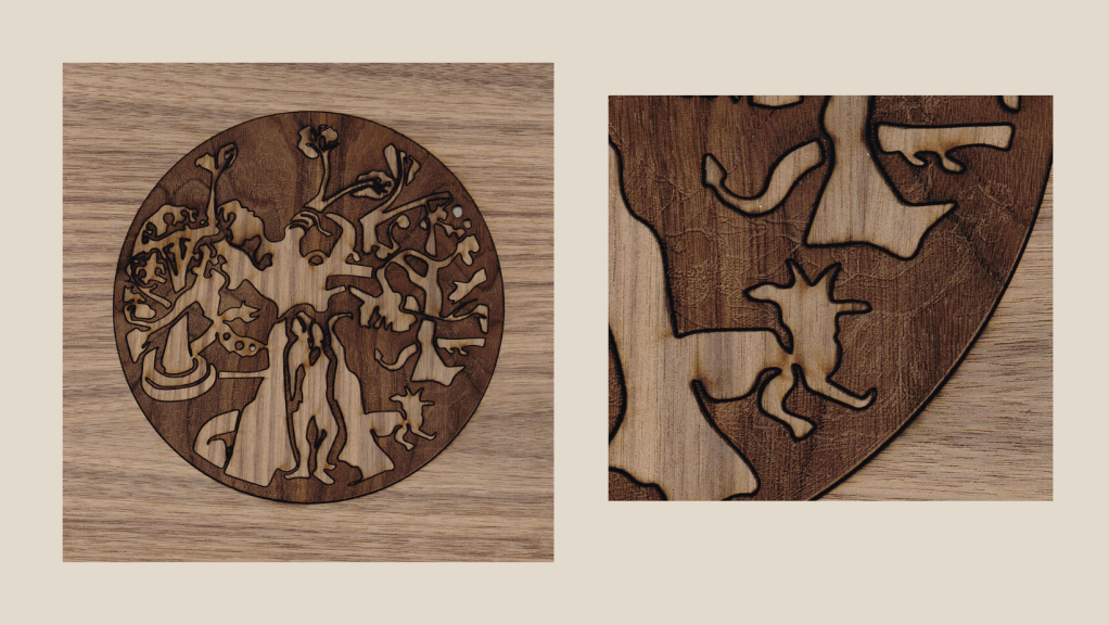 'The New Creation' Black American Walnut inlay, 40x40cm, Charlie Kirkham, art mounted on cork. The dark, earthy red tones came through after washing off the carbon from the laser engraved section. Depicts two figures in Eden