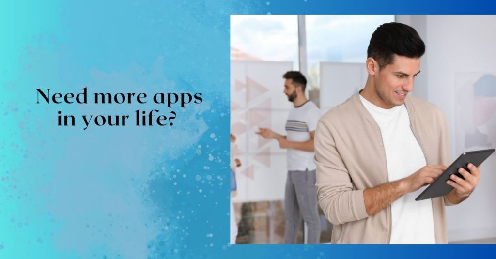 attractive man holding tablet