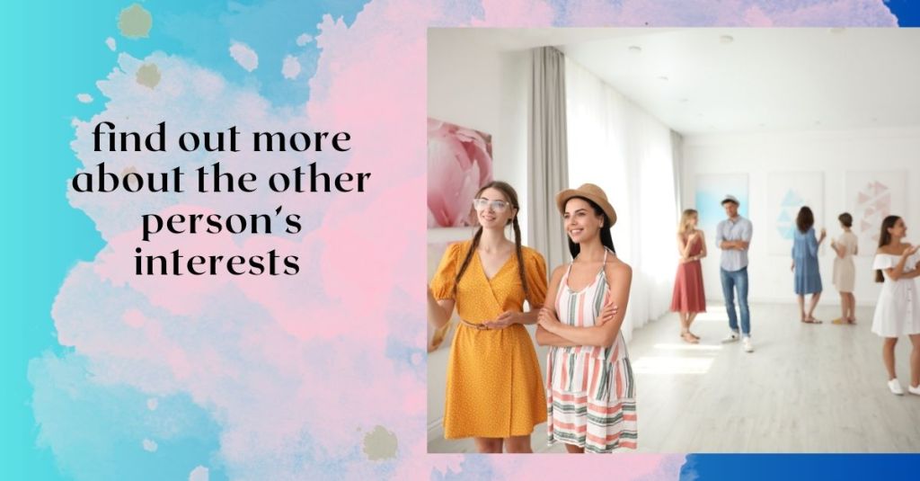 two young women at art gallery making connection 