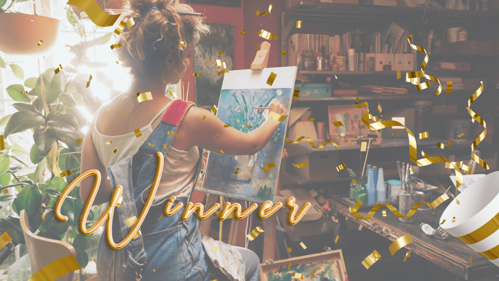 artist painting with gold confetti and winner written over it 