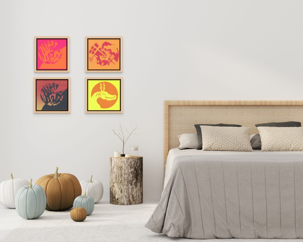 papercuts by Charlie Kirkham next to a low bed in neutral room with pumpkins on floor