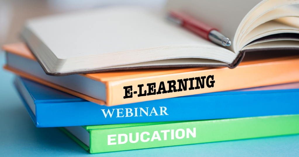 books on learning in a pile saying e-learning, webinar and education