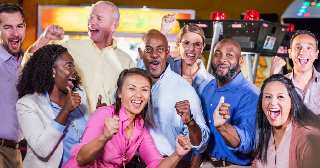 group of happy supportive people in a team
